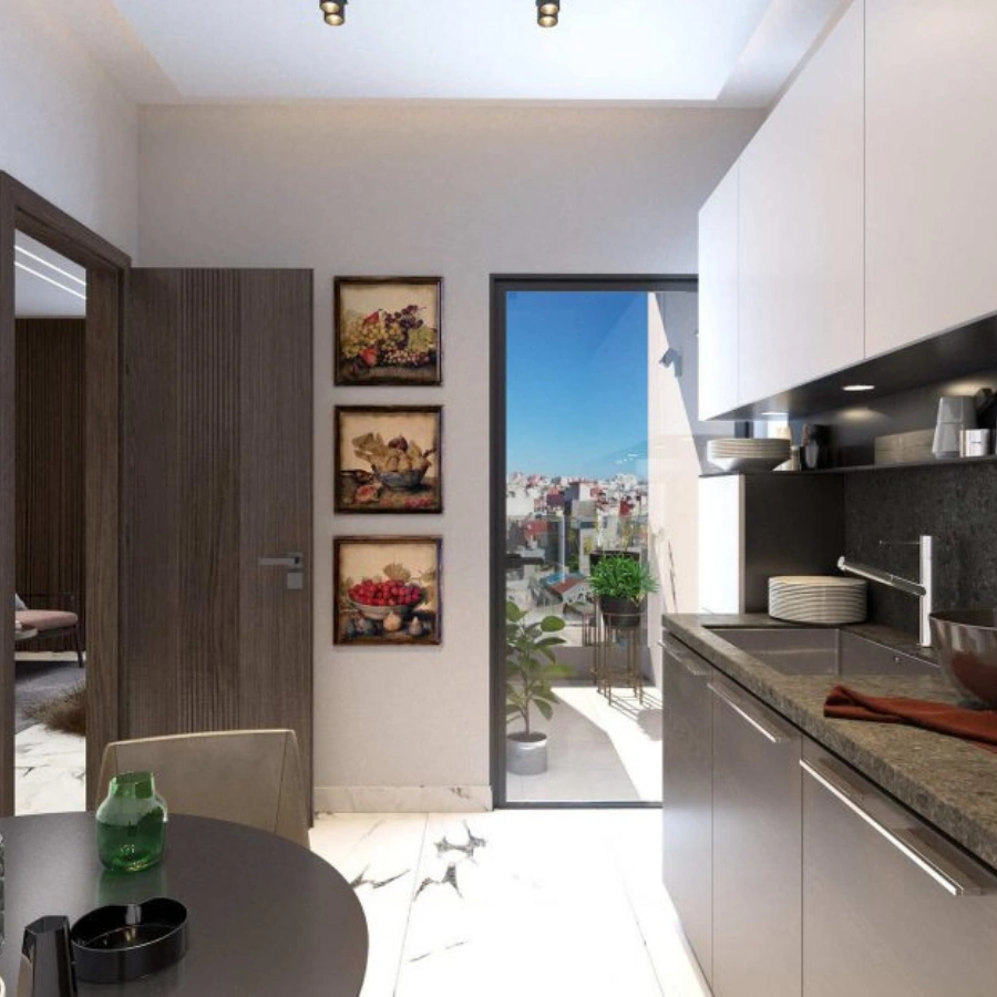 Cuisine moderne dans un appartement à vendre à Résidence Paris, proche du quartier Iberia